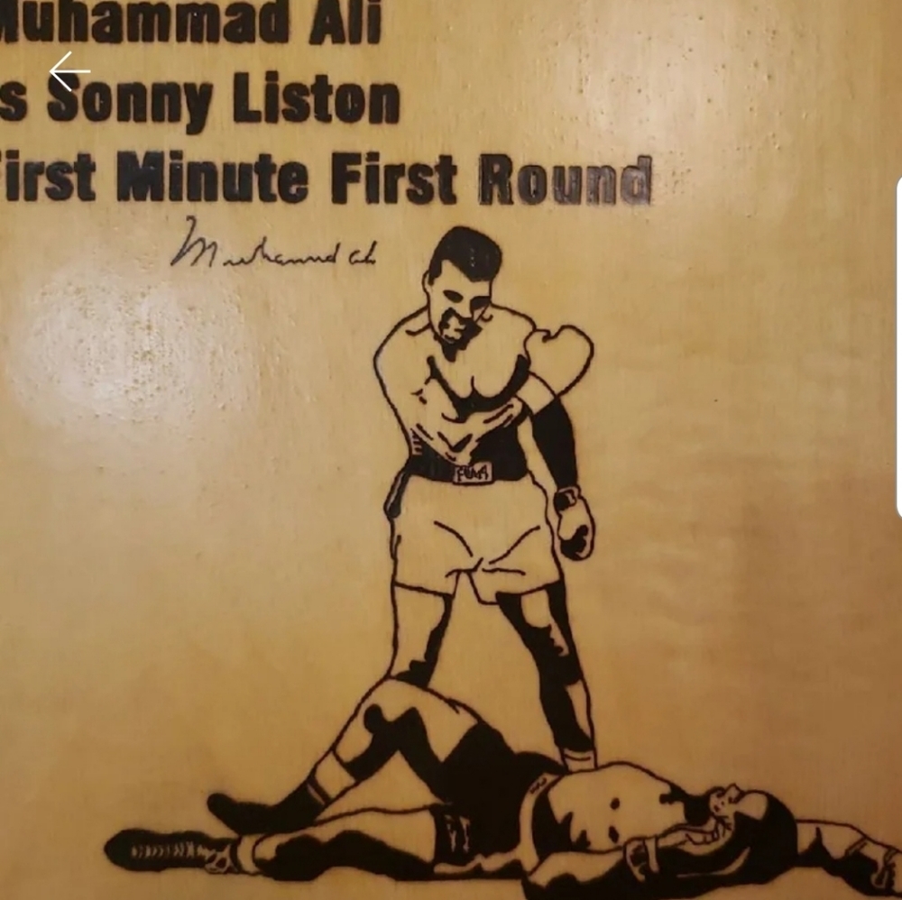 Muhammad Ali wood burning
